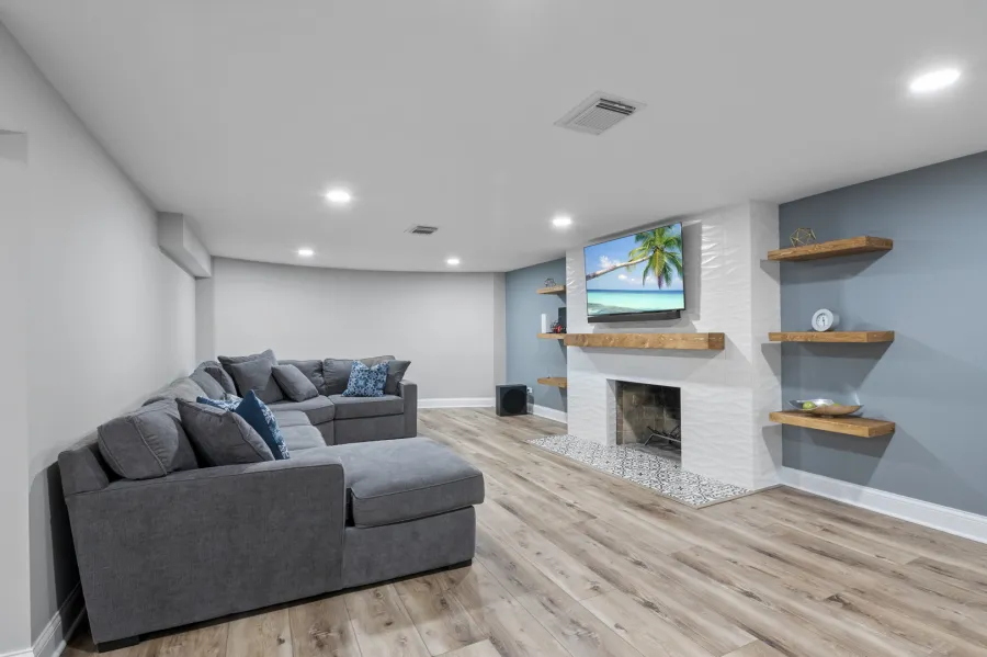 Basement With Wet Bar And Fireplace